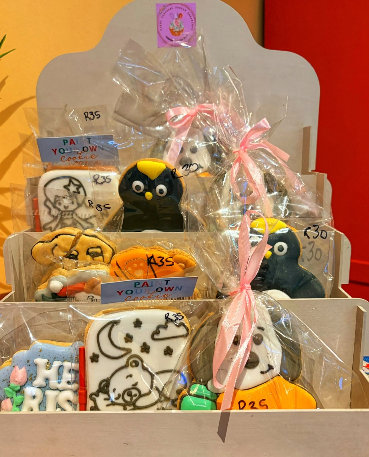 Hand-iced biscuits and paint-your-own biscuit kits on the take-home shelf